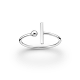 Silver geometric ring with a vertical bar and round element on a white background