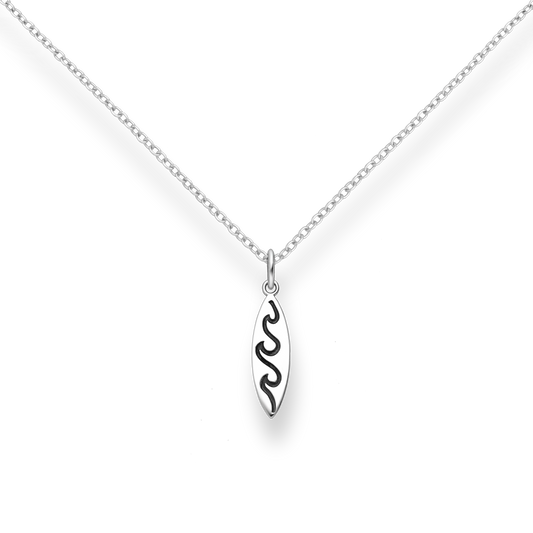 Silver necklace with a wave and surfboard-shaped pendant on a white background